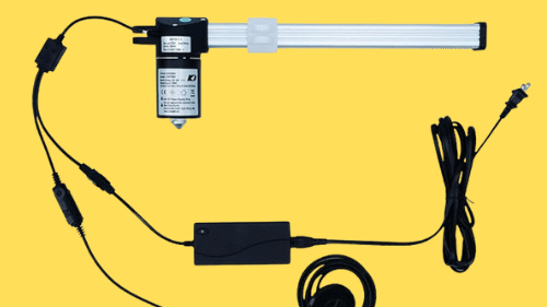 Fruhdi brand power recliner sofa lift chair replacement motor actuator model KDPT007-115 with wiring and power supply on a yellow background.