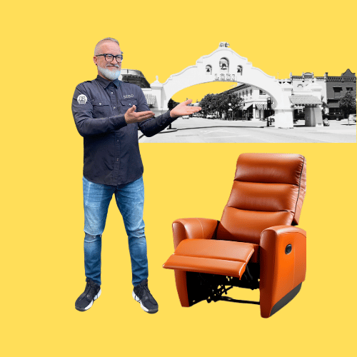 Number2project Mobile Furniture Repair Technician with a beard is presenting a rich brown recliner chair with a historical building of Lodi, California, in the background, set against a bright yellow backdrop.