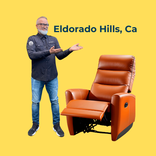 Expert repair technician presents a luxury leather recliner in Eldorado Hills, CA, set against a vibrant yellow background.