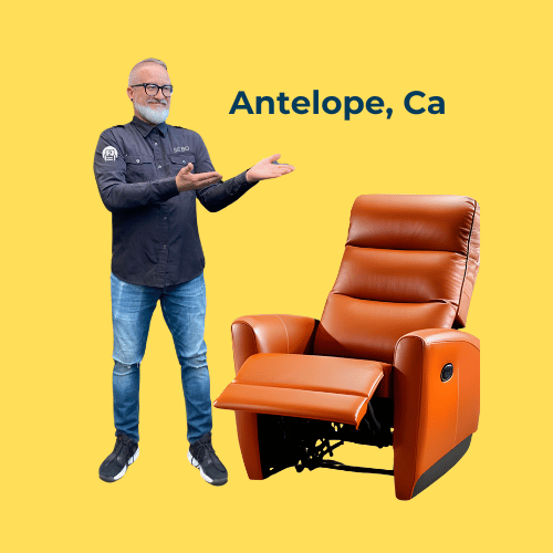 Enthusiastic furniture repair specialist introduces a leather recliner in Antelope, CA, set against a sunny background.