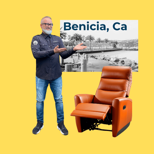 Furniture repair expert from Number2Project showcasing an orange recliner, with a backdrop of the waterfront in Benicia, CA.