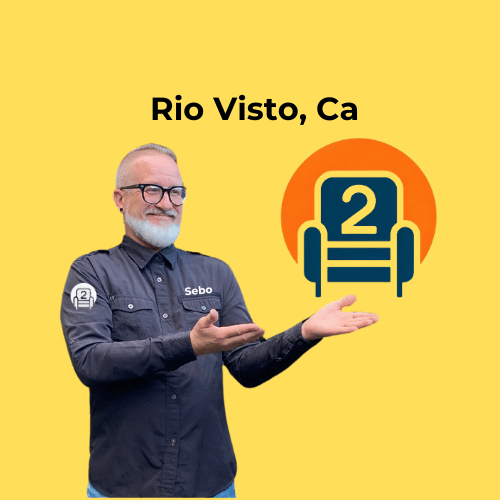 Sebastian, a recliner repair expert from Number2project, pointing towards the Number2project logo with "Rio Vista, CA" text on a yellow background.