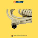 Close-up of the 5-pin round connector and coiled cord from a Pride Mobility lift chair remote.