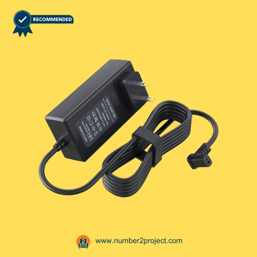 Black recliner power adapter with long flat cable and right-angle connector on a yellow background.