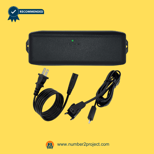 Recliner power supply kit with adapter, power cord, and extension cable featuring a green indicator light on a yellow background.
