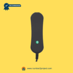 Back side of a recliner remote with QC sticker and cable entry on a yellow background.