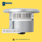 rear view silver round recliner control switch with identification label serial number k2024hl s 1 close up power recliner side control Number2project